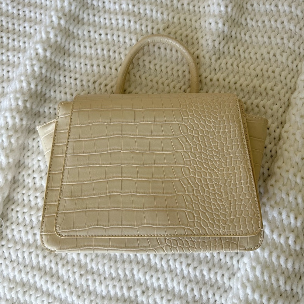 A new day white crocodile purse